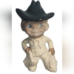 Cowboy resin/ceramic figurine handpainted.